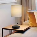White Fabric Shade Nightstand Lamp with Dual USB Fast Charging Ports, Versatile Metal Desk Lighting for Bedroom, Office, and Living Areas