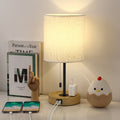 Multifunctional Wood Base USB Bedside Lamp， Table Lamp with Dual USB Ports and AC Outlet.